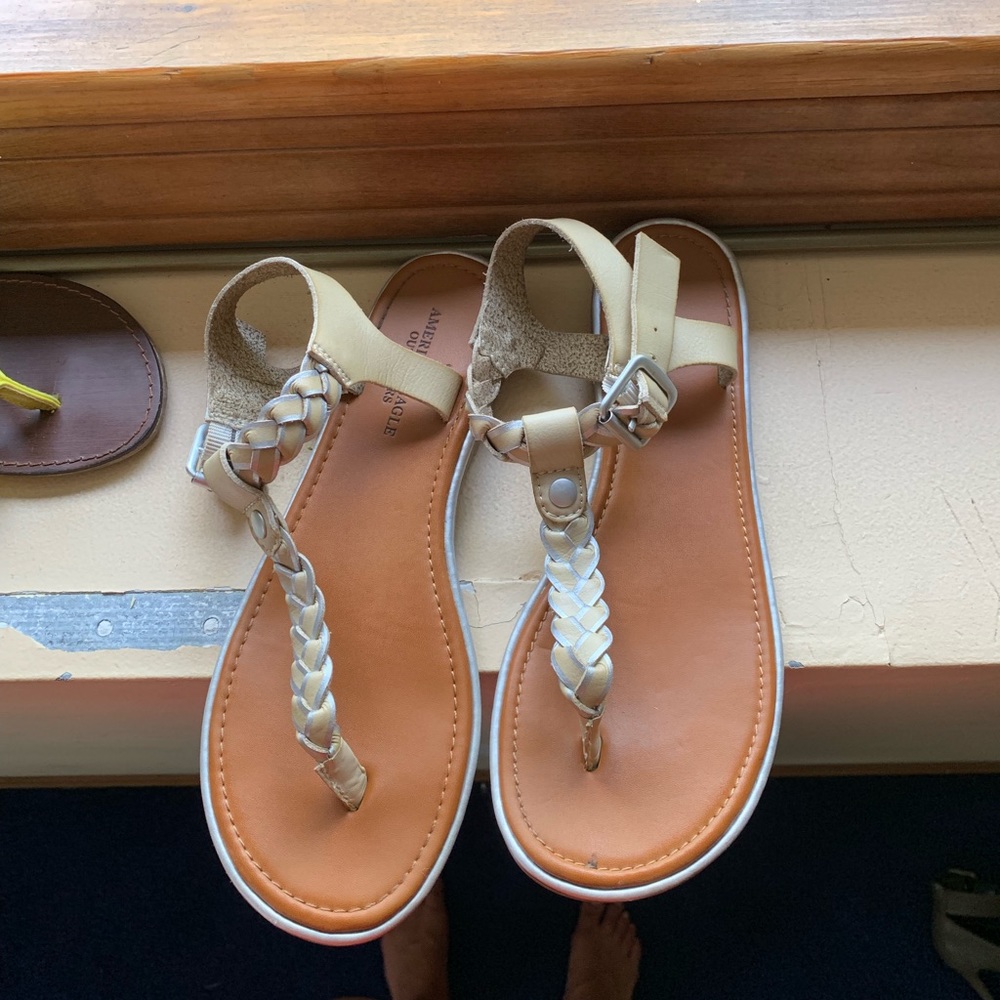 Silver and creme colored AE sandals